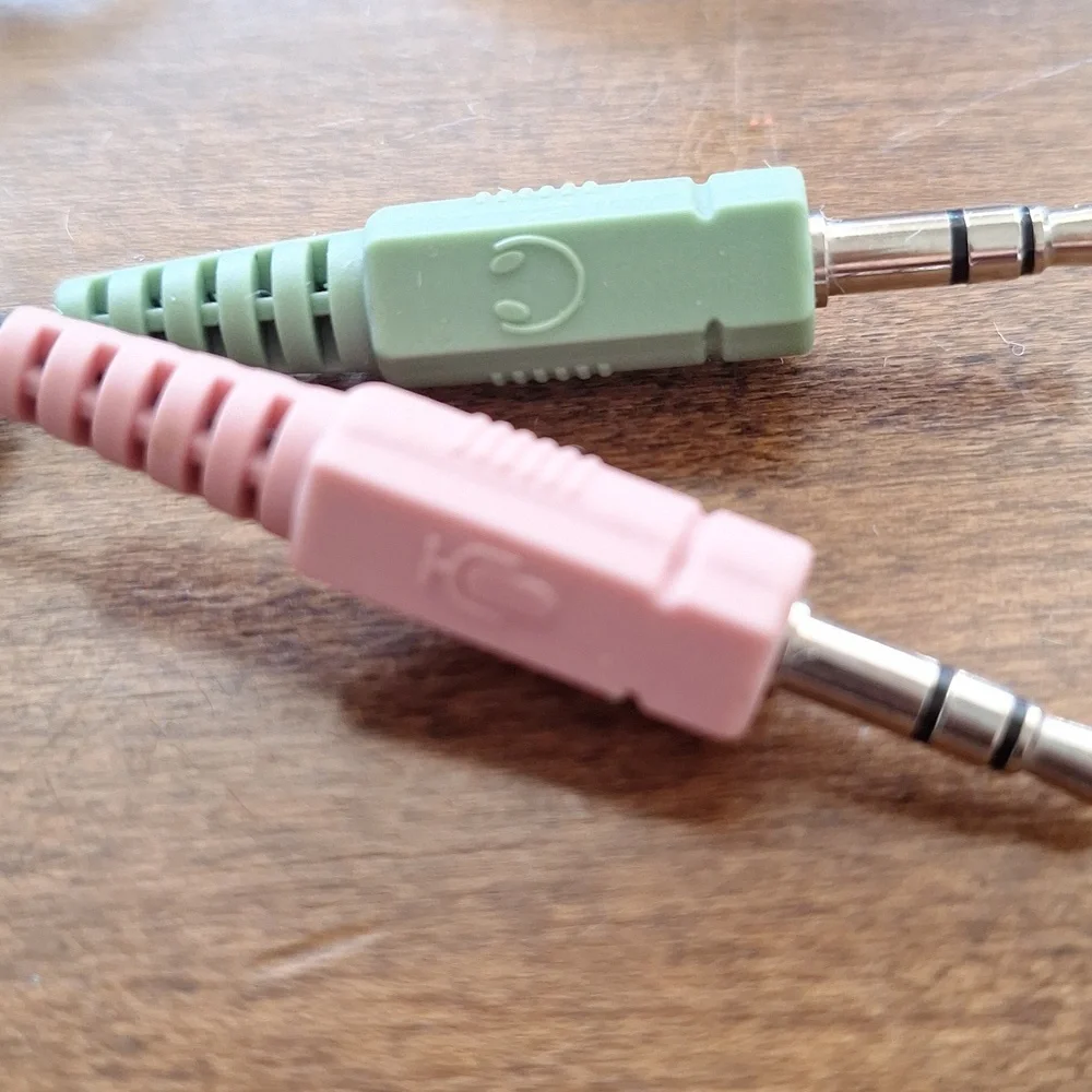 Pink Microphone and Green Audio Cable